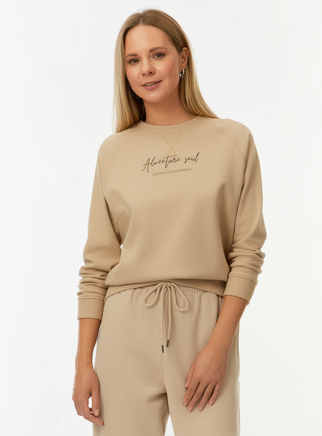 Свитшот хлопковый с надписью oodji для Женщины (бежевый) Свитшот хлопковый с надписью oodji для Женщины (бежевый), 14807049/50146N/3337P